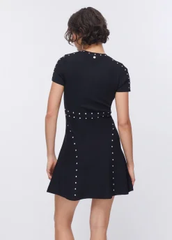 Abito in maglia con borchie