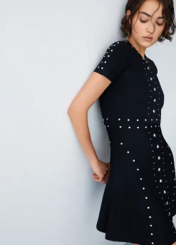 Abito in maglia con borchie