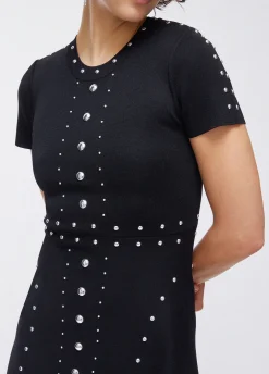 Abito in maglia con borchie