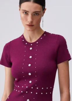 Abito in maglia con borchie
