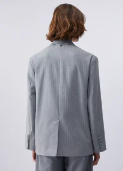 Blazer gessato con borchie
