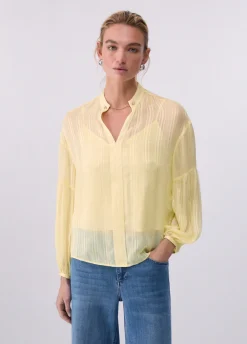 Blusa con catena gioiello