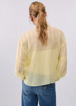 Blusa con catena gioiello