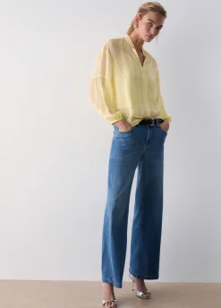 Blusa con catena gioiello