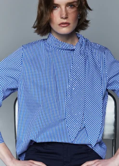 Blusa con maxi fiocco