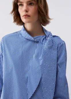 Blusa con maxi fiocco