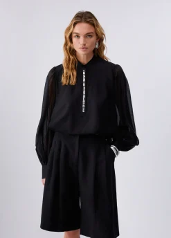 Blusa con ricami gioiello
