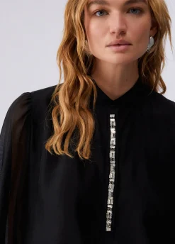 Blusa con ricami gioiello
