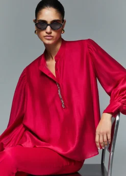 Blusa con ricami gioiello