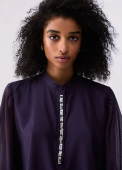 Blusa con ricami gioiello