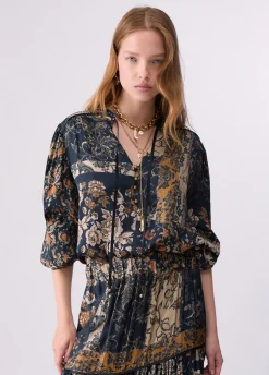 Blusa con stampa all-over