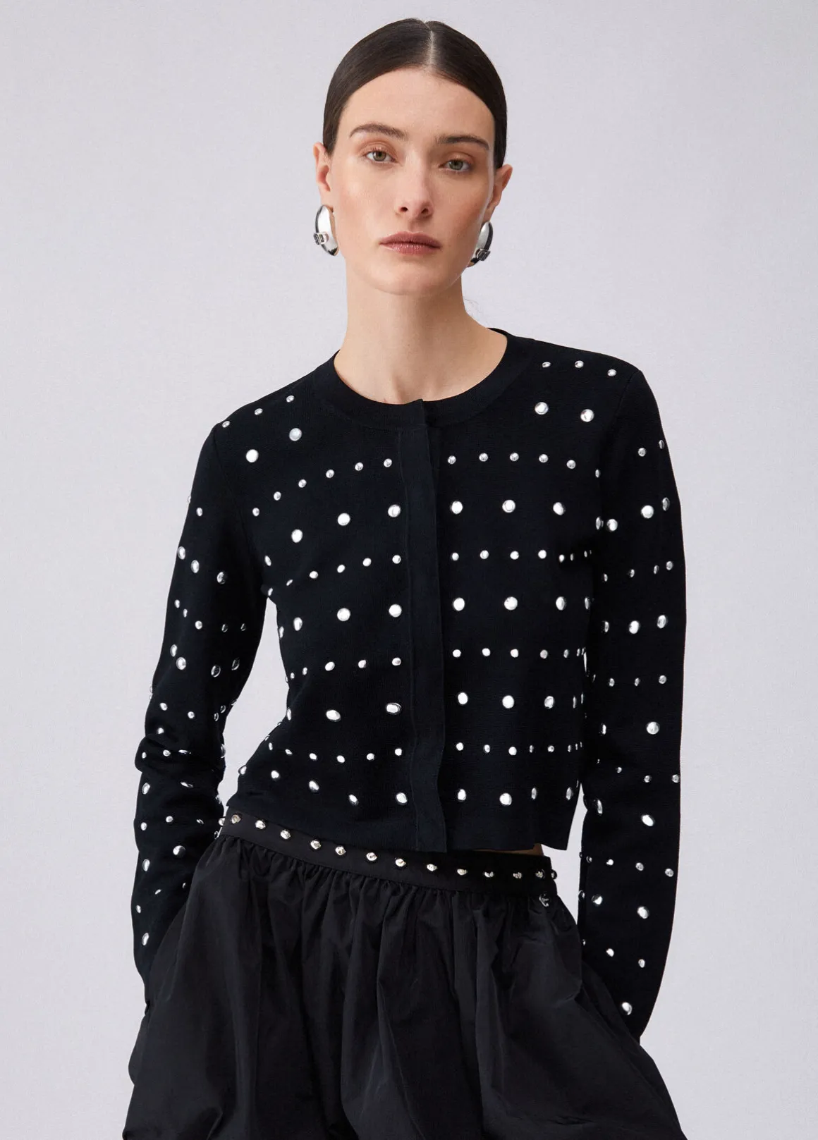 Cardigan con borchie