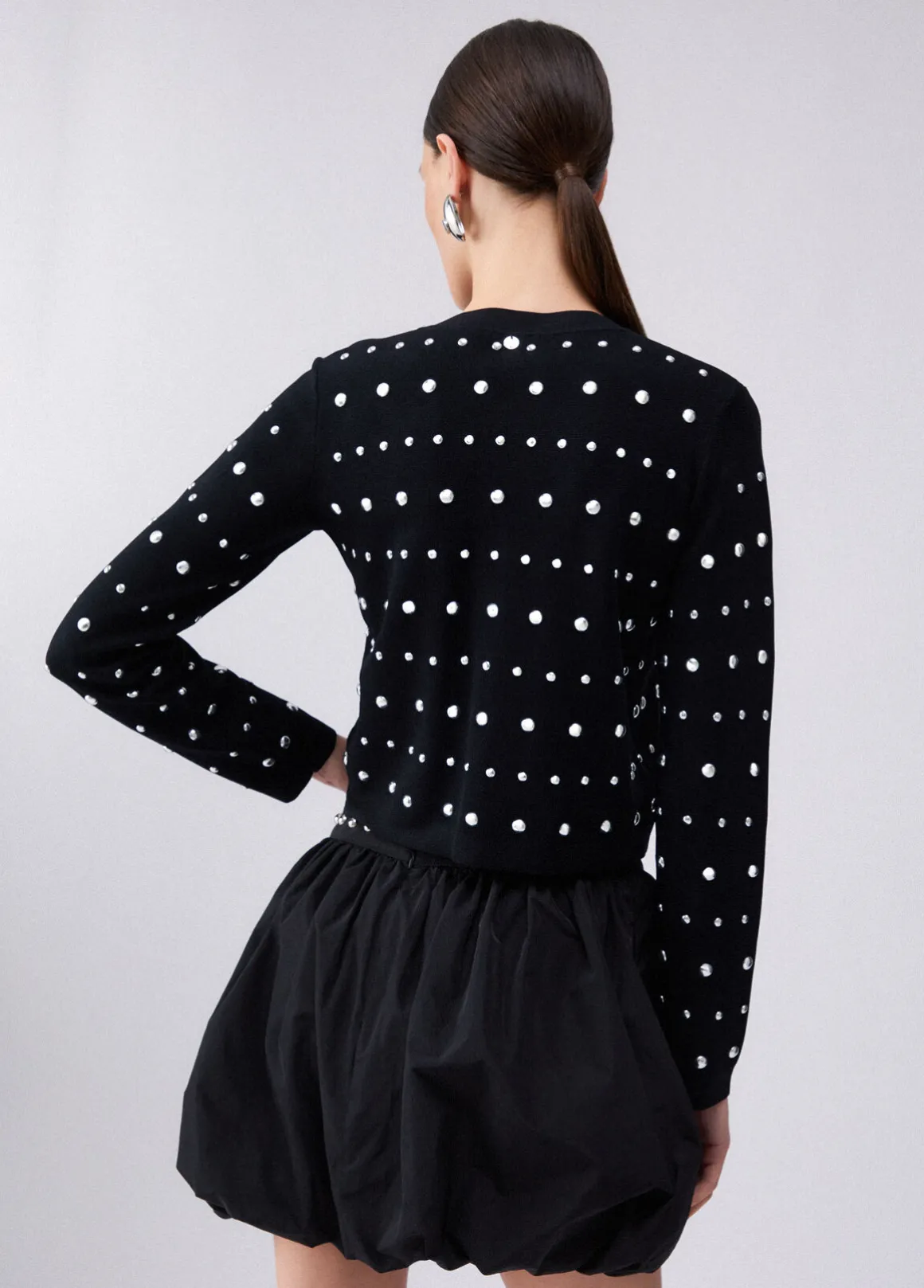 Cardigan con borchie