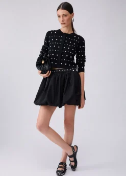 Cardigan con borchie