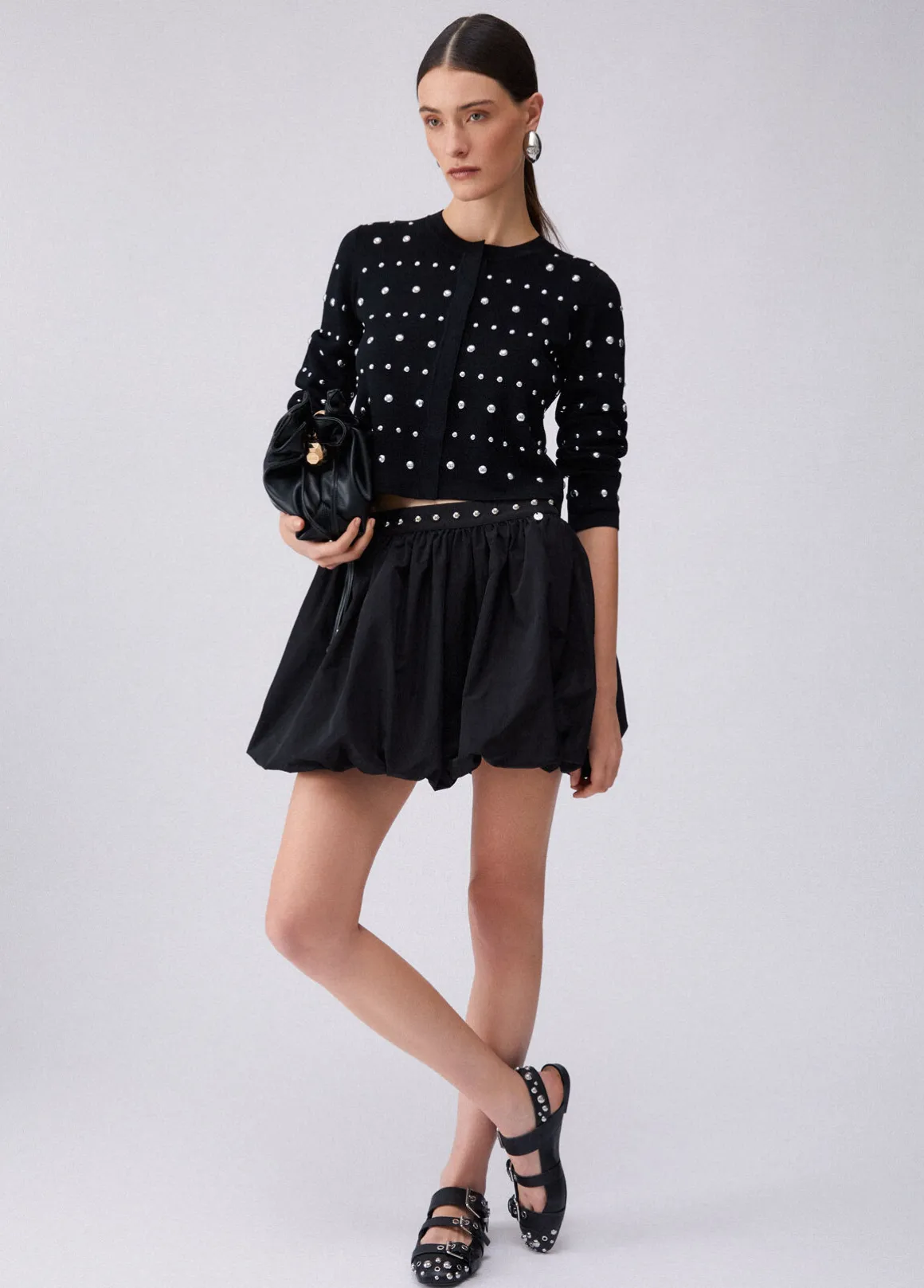Cardigan con borchie
