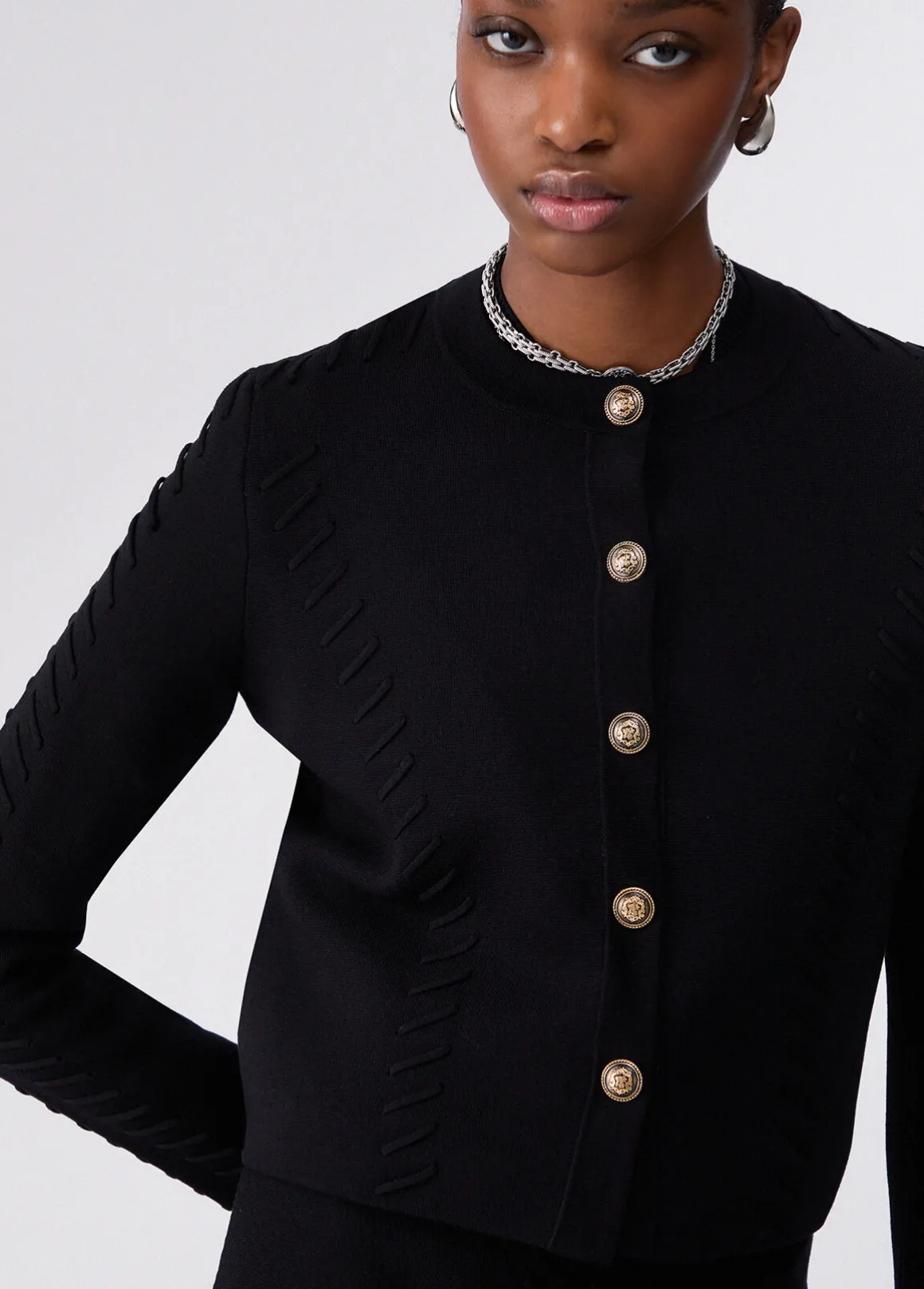 Cardigan con dettagli intrecciati