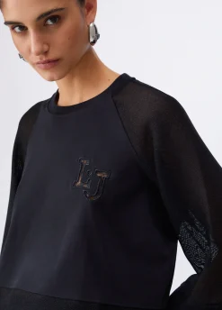 Felpa con inserti in mesh