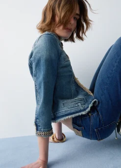 Giacca in denim con catene gioiello