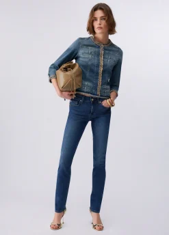 Giacca in denim con catene gioiello