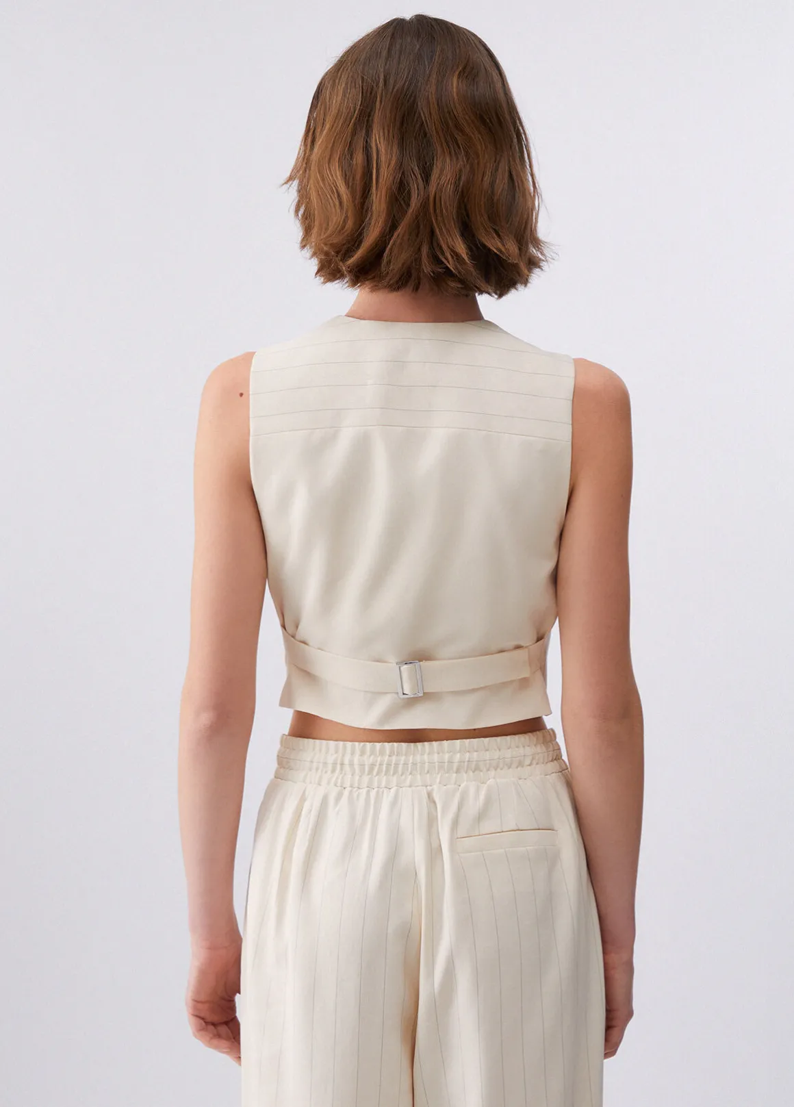 Gilet gessato con ricami gioiello