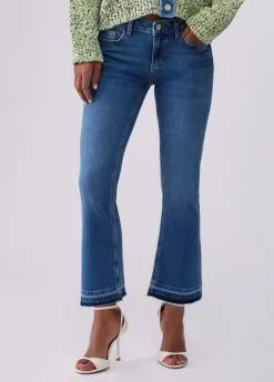 Jeans bootcut con orli unfinished