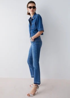 Jeans bootcut con orli unfinished