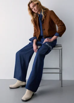 Jeans con castoni gioiello