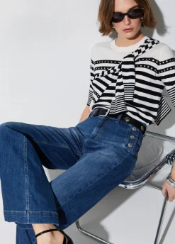 Jeans flare a vita alta con bottoni