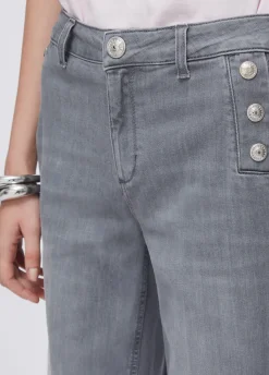 Jeans flare a vita alta con bottoni