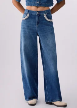 Jeans flare con applicazioni gioiello