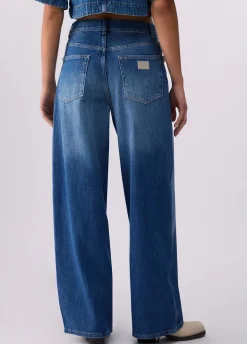 Jeans flare con applicazioni gioiello