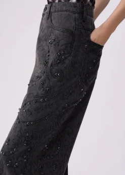 Jeans flare con castoni gioiello