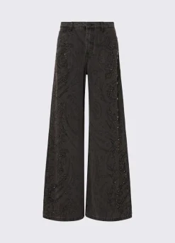 Jeans flare con castoni gioiello
