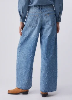 Jeans flare con dettagli laserati