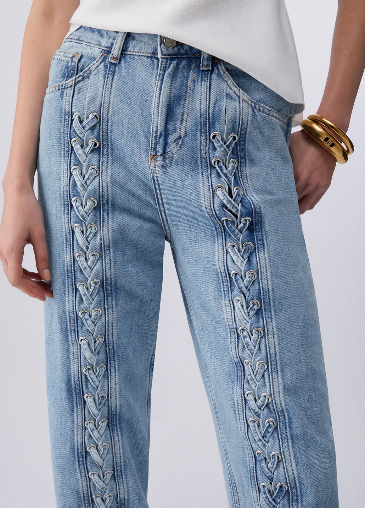 Jeans flare con intreccio