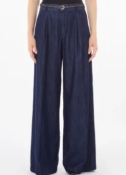 Jeans flare con pinces