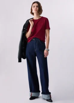 Jeans flare con risvolto