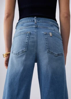 Jeans flare con risvolto