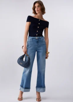 Jeans flare con risvolto
