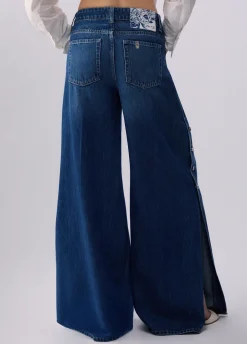 Jeans flare con spacchetti