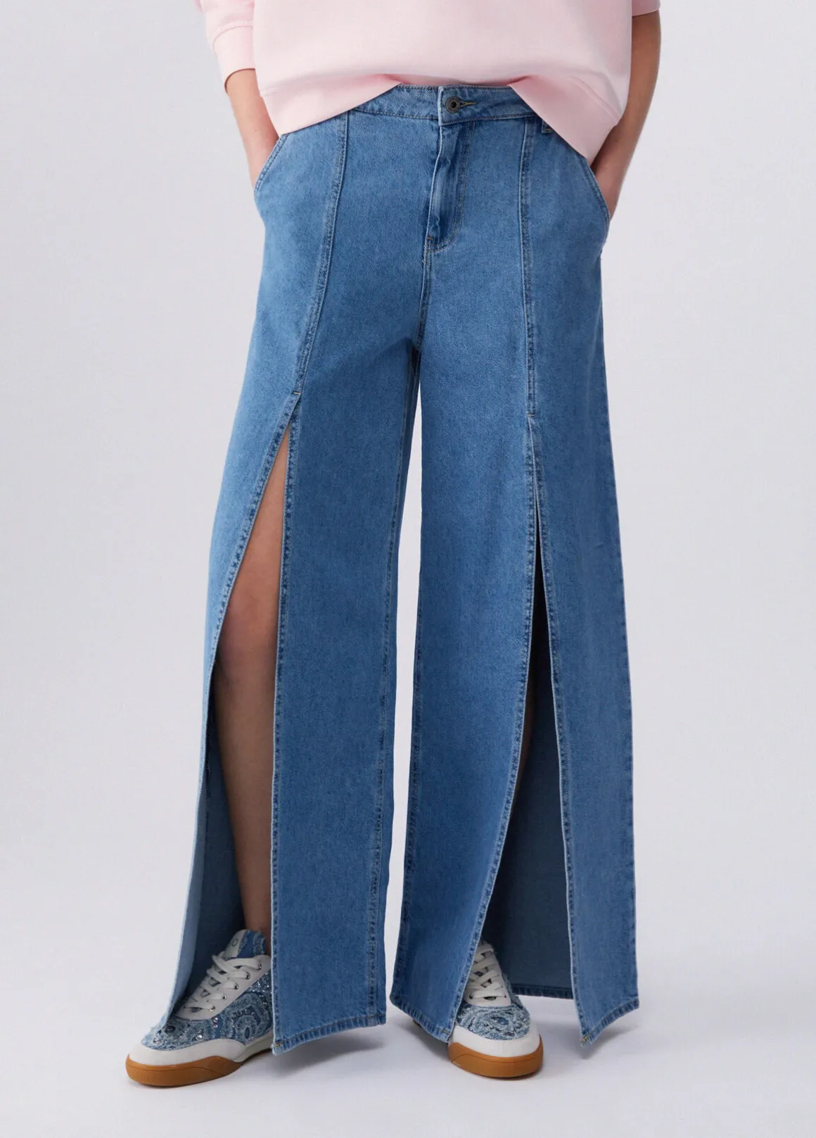 Jeans flare con spacchetti