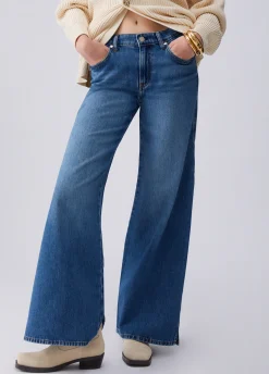 Jeans flare con spacchetti laterali