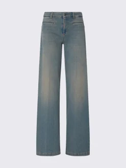 Jeans flare con tasche a filetto