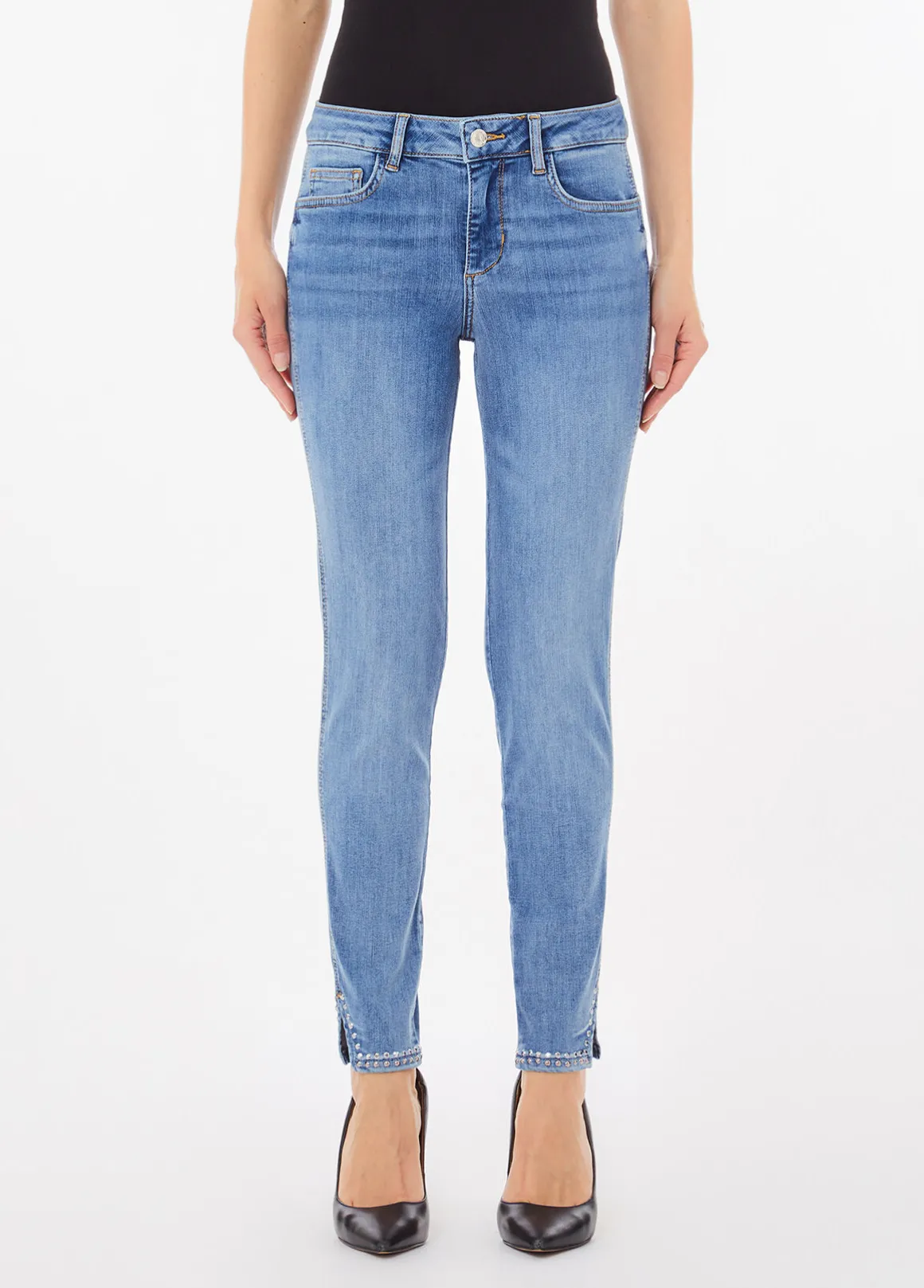 Jeans skinny con borchie