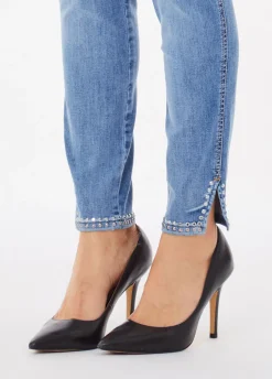 Jeans skinny con borchie