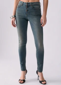 Jeans skinny con bottoni lavorati