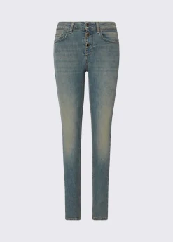 Jeans skinny con bottoni lavorati