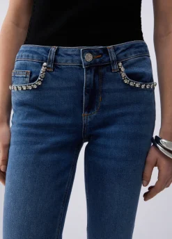 Jeans skinny con ricami gioiello