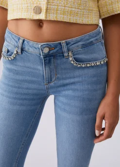 Jeans skinny con ricami gioiello
