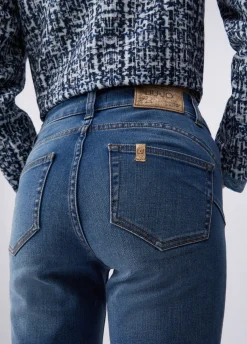 Jeans skinny con risvolto